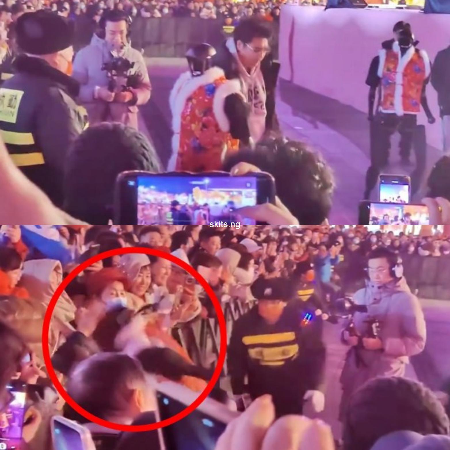 Humanoid robot dragged away after attacking people at festival video