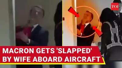 French president emmanuel macron is hit in the face by his wife video