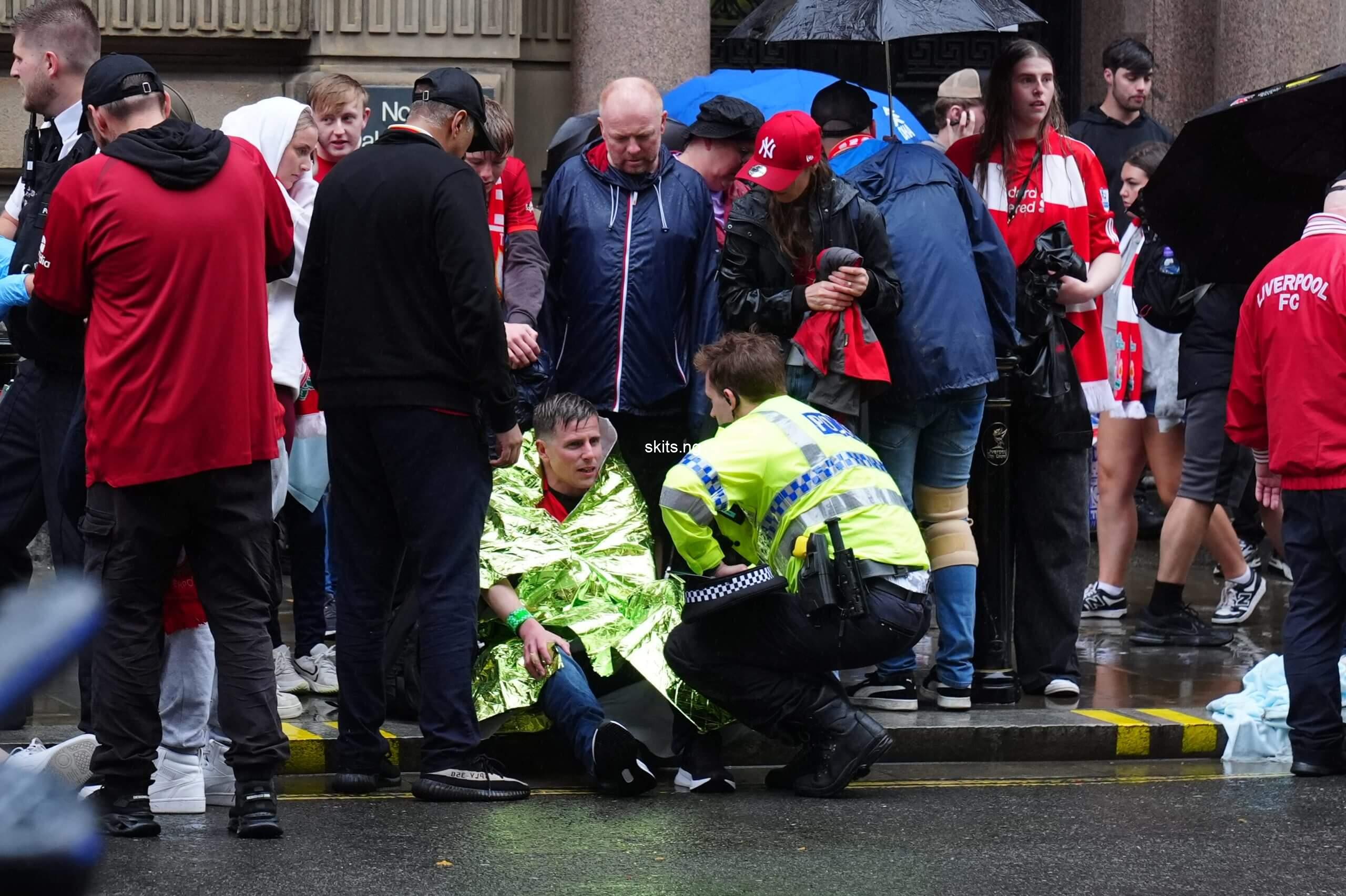 Multiple people injured as car ploughs into crowd of liverpool fans celebrating their premier league title win during trophy parade photos